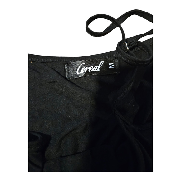 Coreal Medium Sleeveless Black Dress - Picture 2 of 6